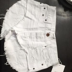 Super cute white One Teaspoon rollers. Brand new